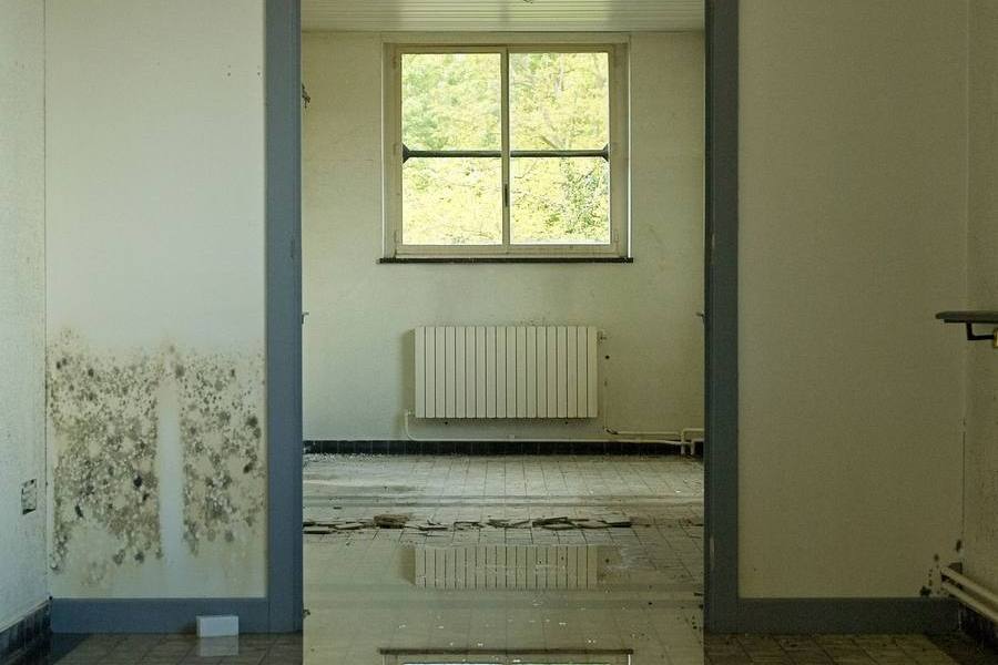 Room with a flooded floor from water damage